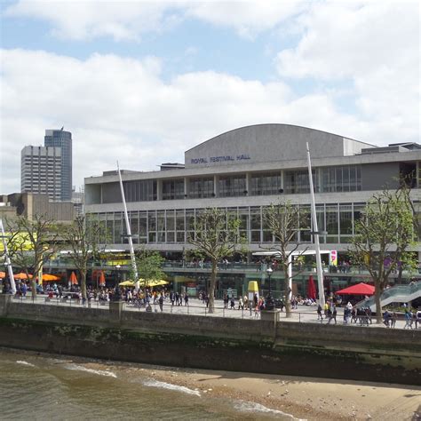 Royal festival hall - The Royal Festival Hall was opened in 1951 at Southbank Centre in conjunction with the Festival of Britain. The Royal Festival Hall is both a popular gathering place a leading entertainment venue with modernist architectural styling consisting of a 2900 seat auditorium, the Clore Ballroom, Southbank Centre Shop, several restaurants and the Siason Poetry Library. 